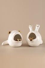 Whimsical ceramic fish ashtray with white finish and gold accent detailing