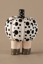 Pop art pumpkin sculpture with black polka dots modern home decor