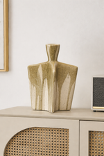Decorative vase on a cabinet with a minimal background