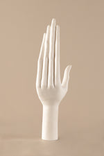 Minimalist white ceramic hand sculpture with smooth glossy finish for luxury home decor