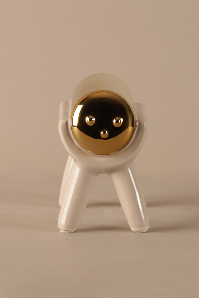 Modern ceramic sculptural decor with beige body and gold electroplated top