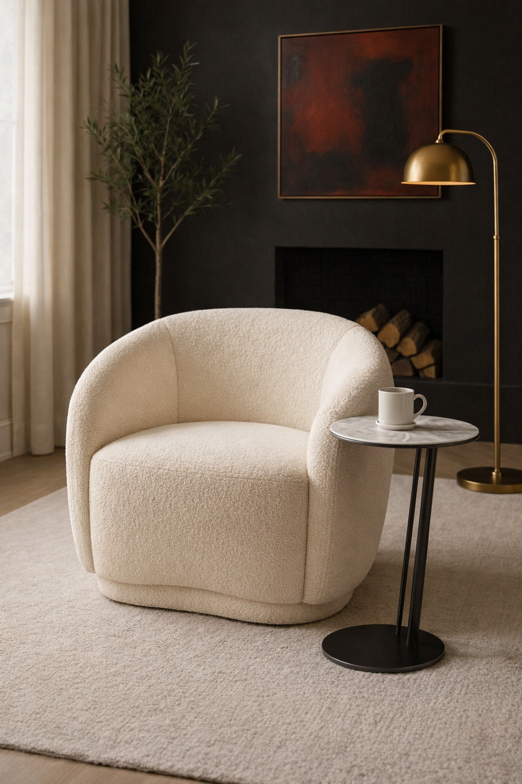 Beige armchair in a living room with a side table, lamp, and abstract painting.
