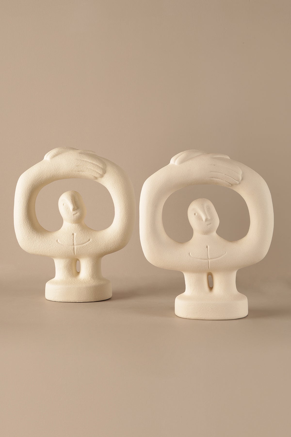 Abstract human form ceramic sculpture with soft ivory matte finish modern decor