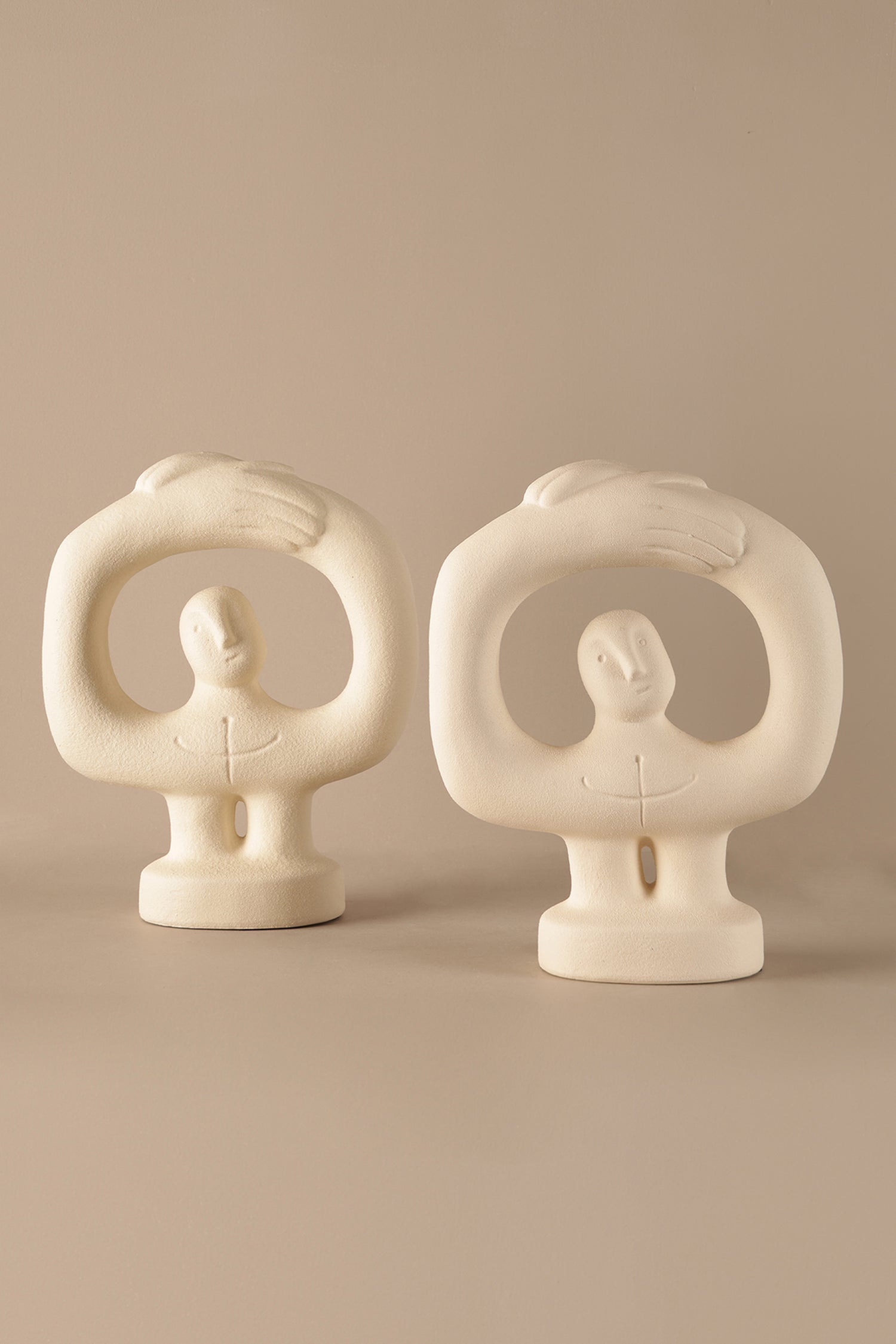 Abstract human form ceramic sculpture with soft ivory matte finish modern decor