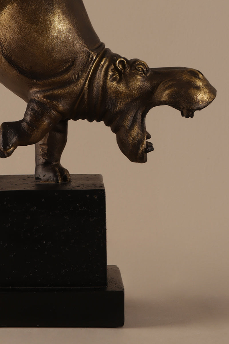 Bronze finish hippo sculpture showing textured detailing and sculptural form