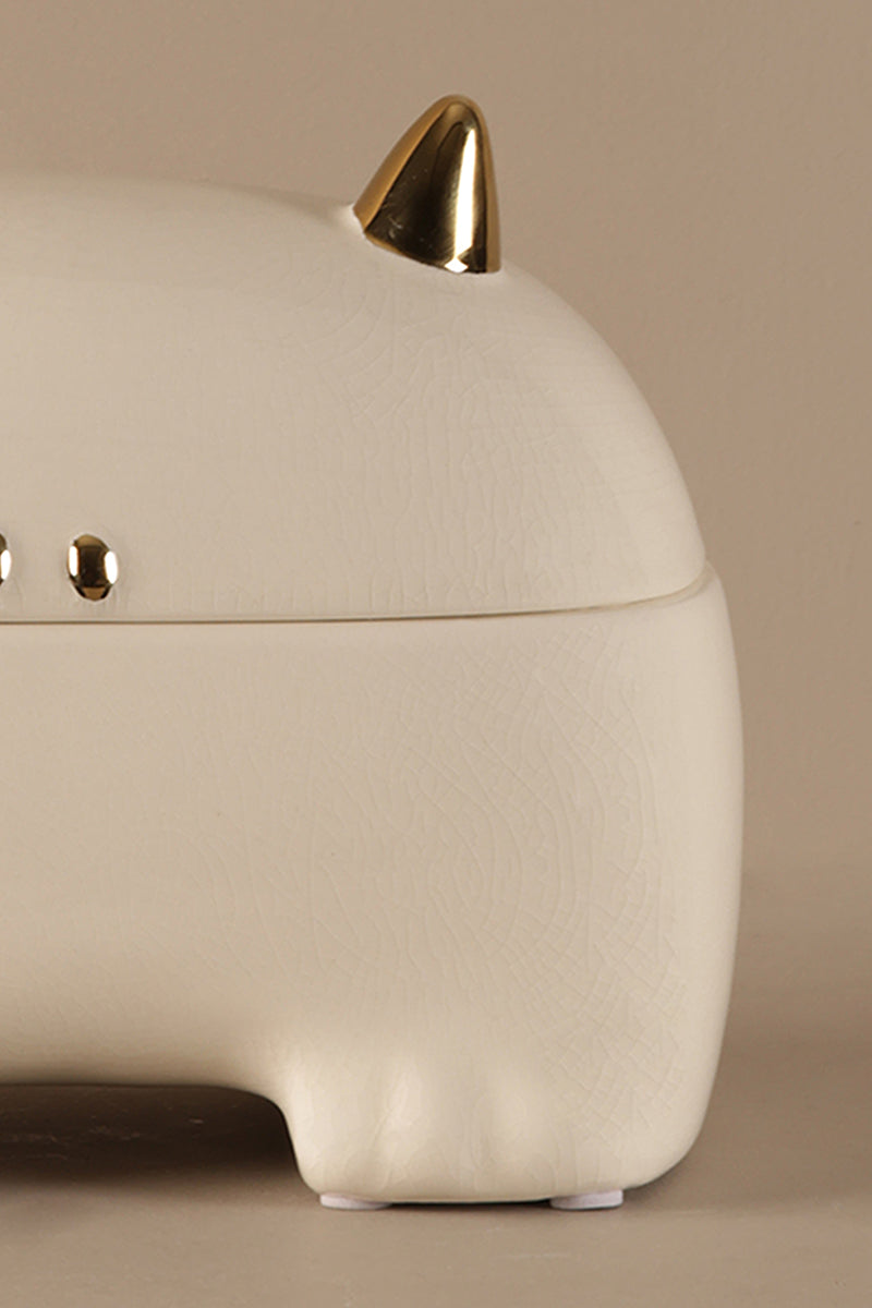 White ceramic decorative storage jar with gold detailing