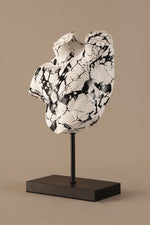 Contemporary torso decor sculpture with white and black marbled finish
