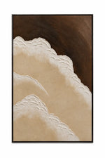 A framed abstract art print featuring textured beige and white cloud-like forms against a dark brown background, enclosed in a thin black frame.