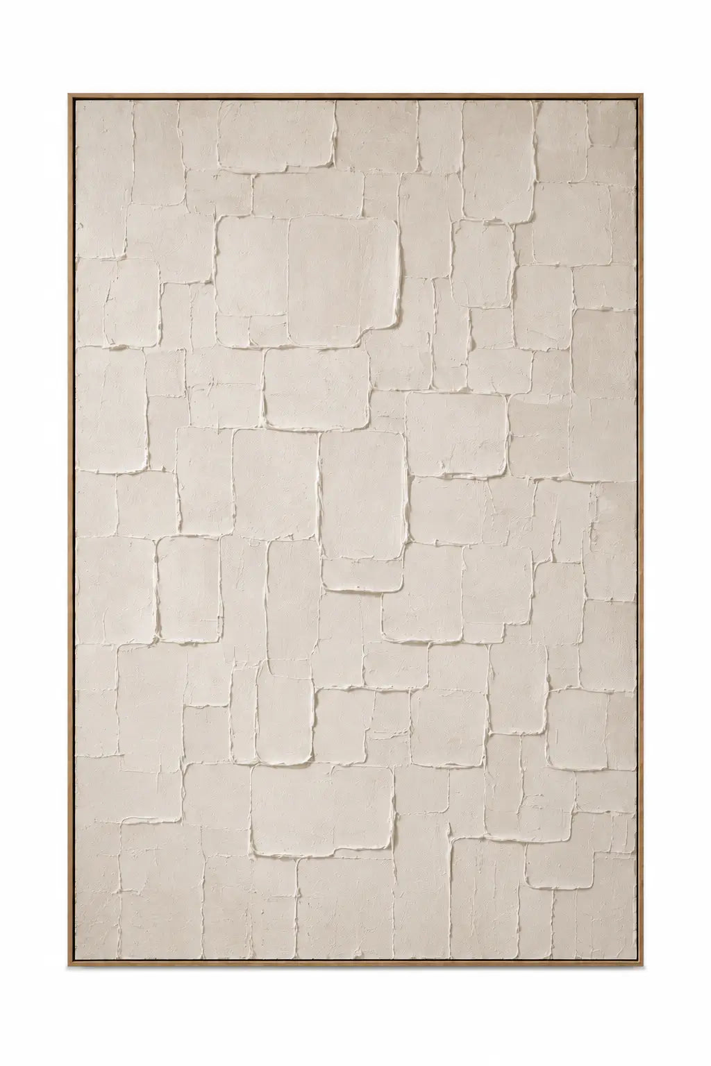 A framed abstract wall art piece featuring a textured pattern of overlapping rectangular shapes in warm off-white and beige tones, enclosed in a thin brown frame against a white background.