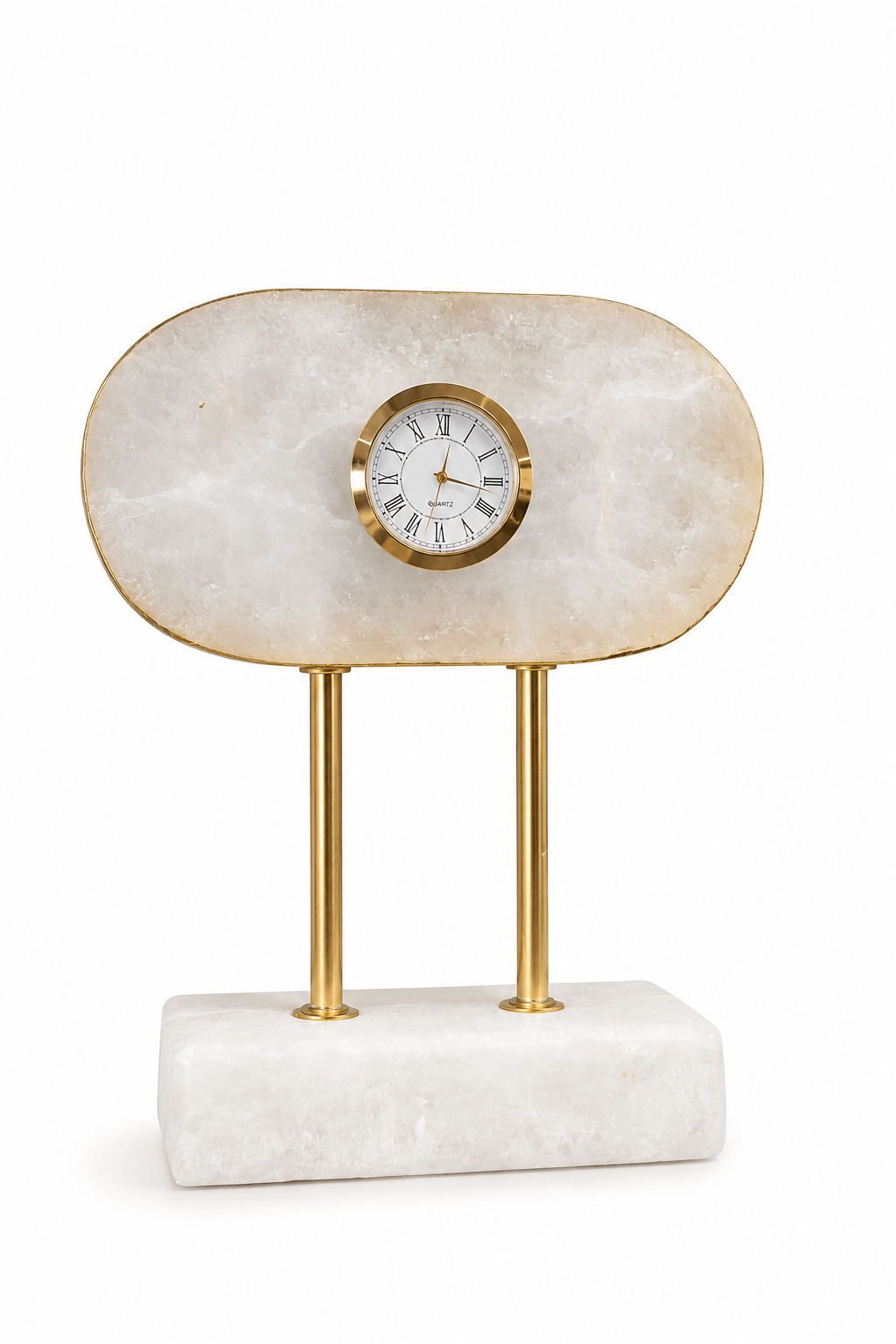 A modern table clock featuring a polished cream-colored onyx stone top with a gold-tone rim and a central white clock face, supported by two slim gold brass legs on a rectangular white marble base, isolated on a white background.