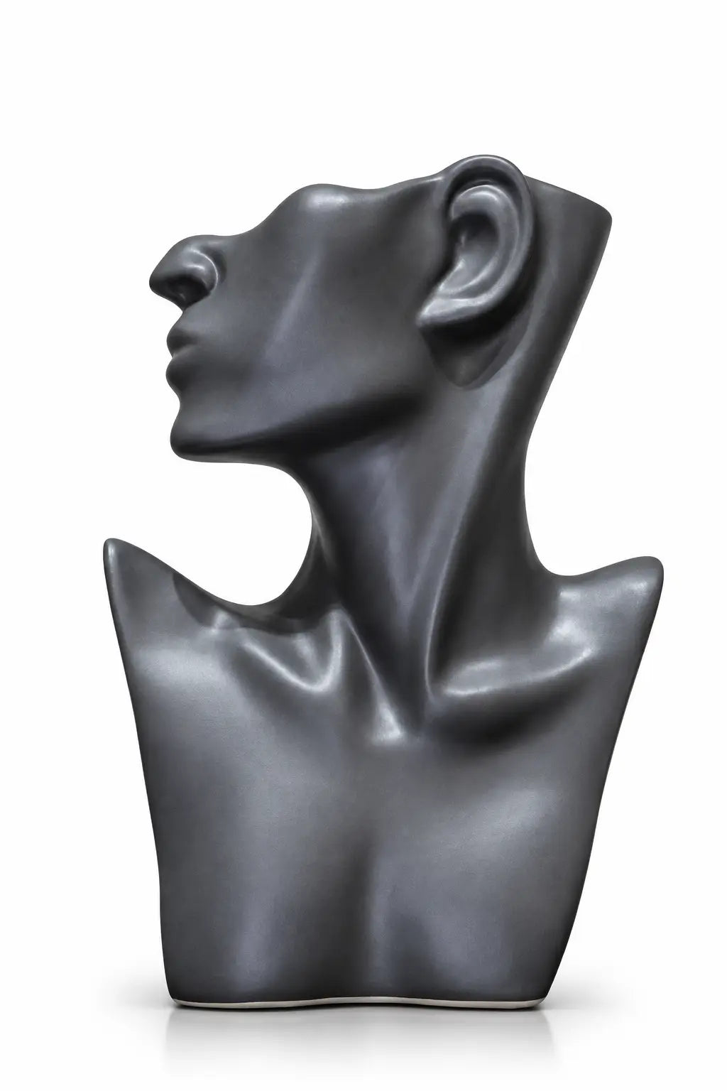 A dark gray, matte-finish sculptural bust of a human head and upper chest in profile, shown on a clean white background.