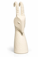 An off-white ceramic goat head holder with curved horns, featuring a ribbed, textured surface and a small cutout at the base, shown on a white background.