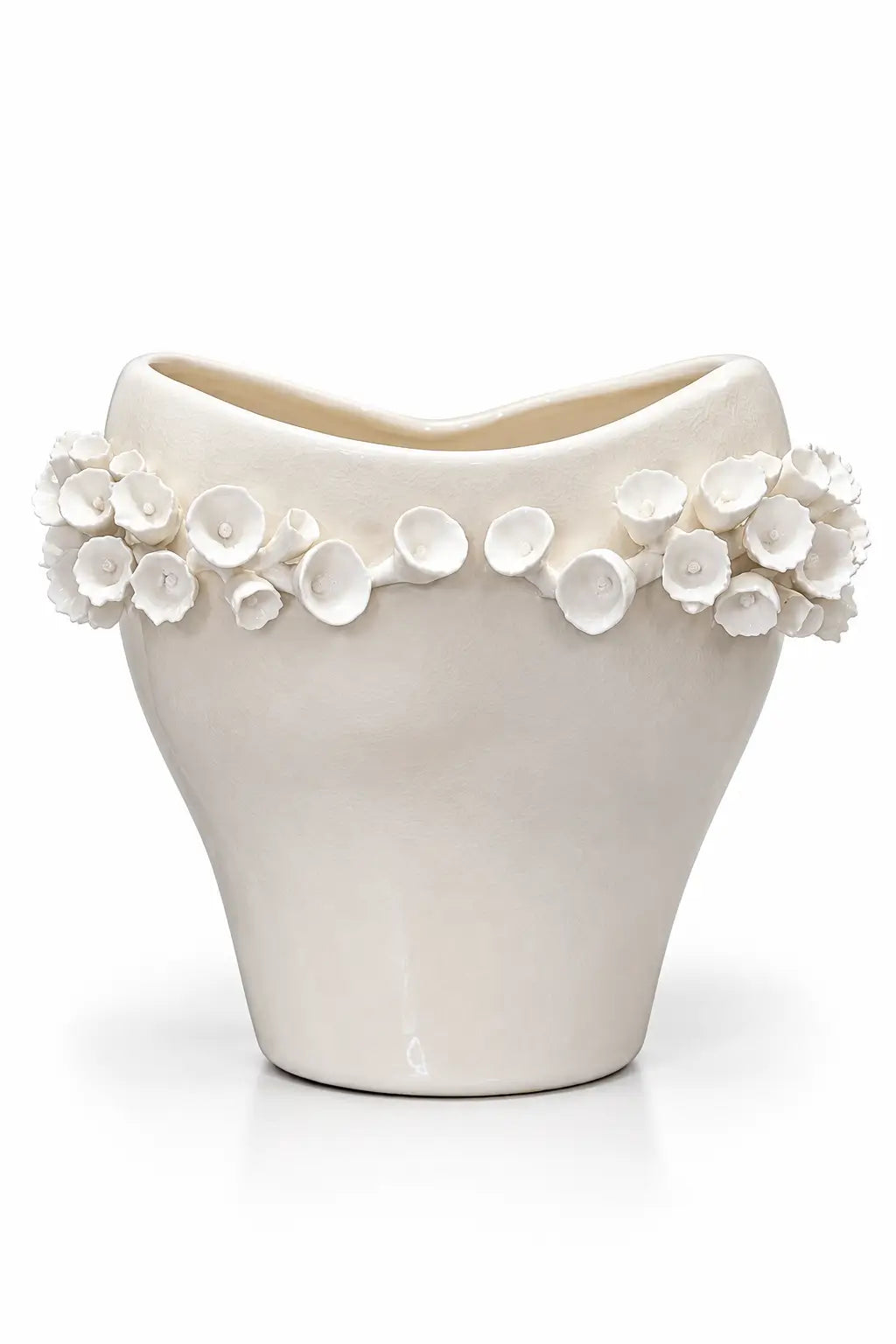 An off-white ceramic planter with a wavy, open top and a decorative border of 3D floral buds around the rim, set against a plain white background.