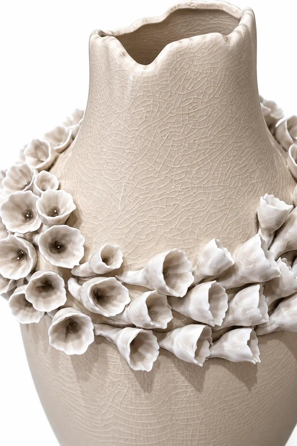 A beige ceramic vase with a textured, crackled surface, decorated with a wide collar of white and beige sculpted flower-like ruffles around the neck, shown against a plain white background.