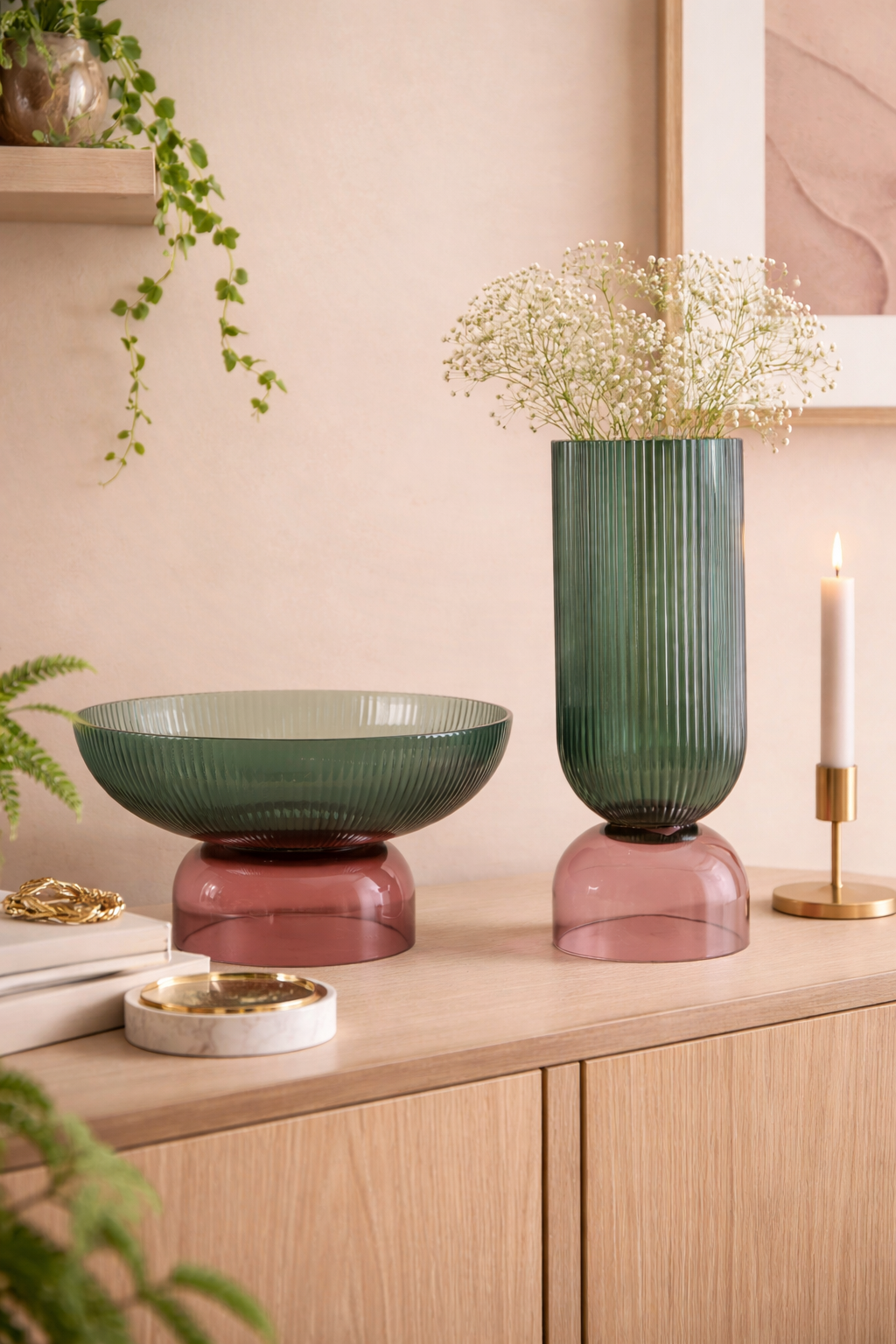 Medium ribbed green glass pedestal vase with terracotta base, modern decorative glass vase for contemporary interiors.