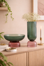 Medium ribbed green glass pedestal vase with terracotta base, modern decorative glass vase for contemporary interiors.