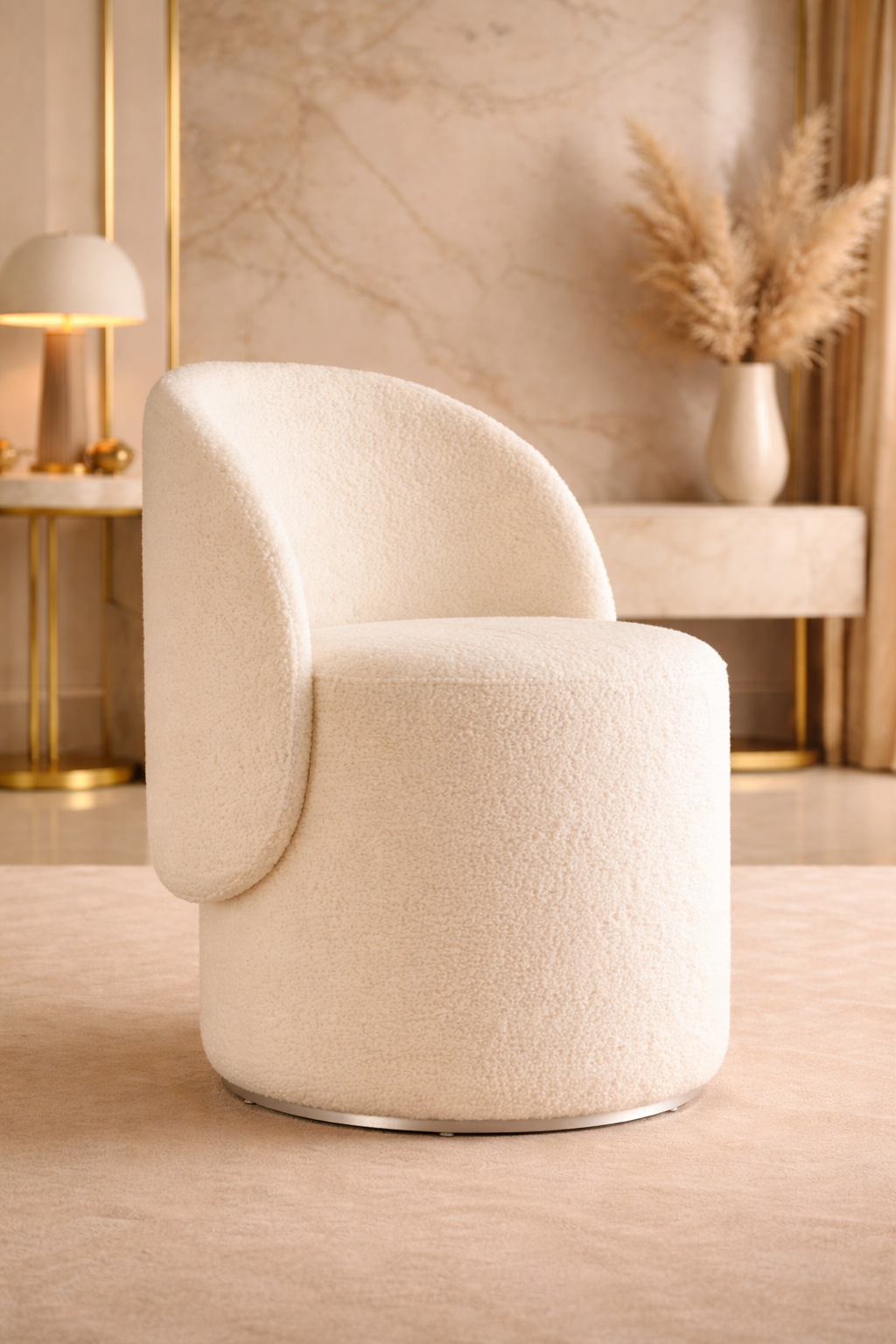 Beige armchair in a stylish room with decor elements.