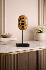 Decorative lamp on a marble surface with a neutral background