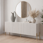 White console table with decorative items in a room setting
