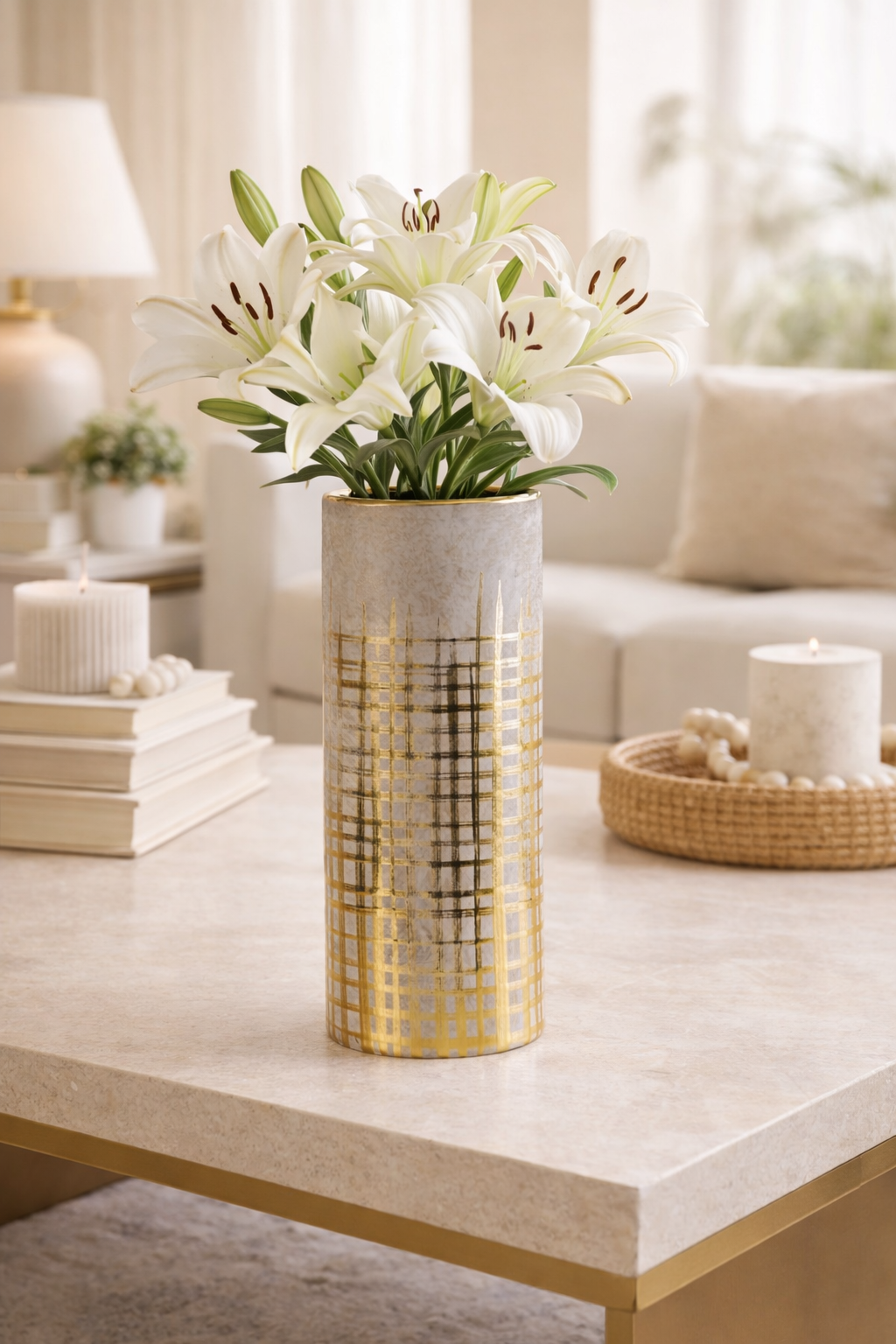 Decorative vase with flowers on a coffee table in a living room setting