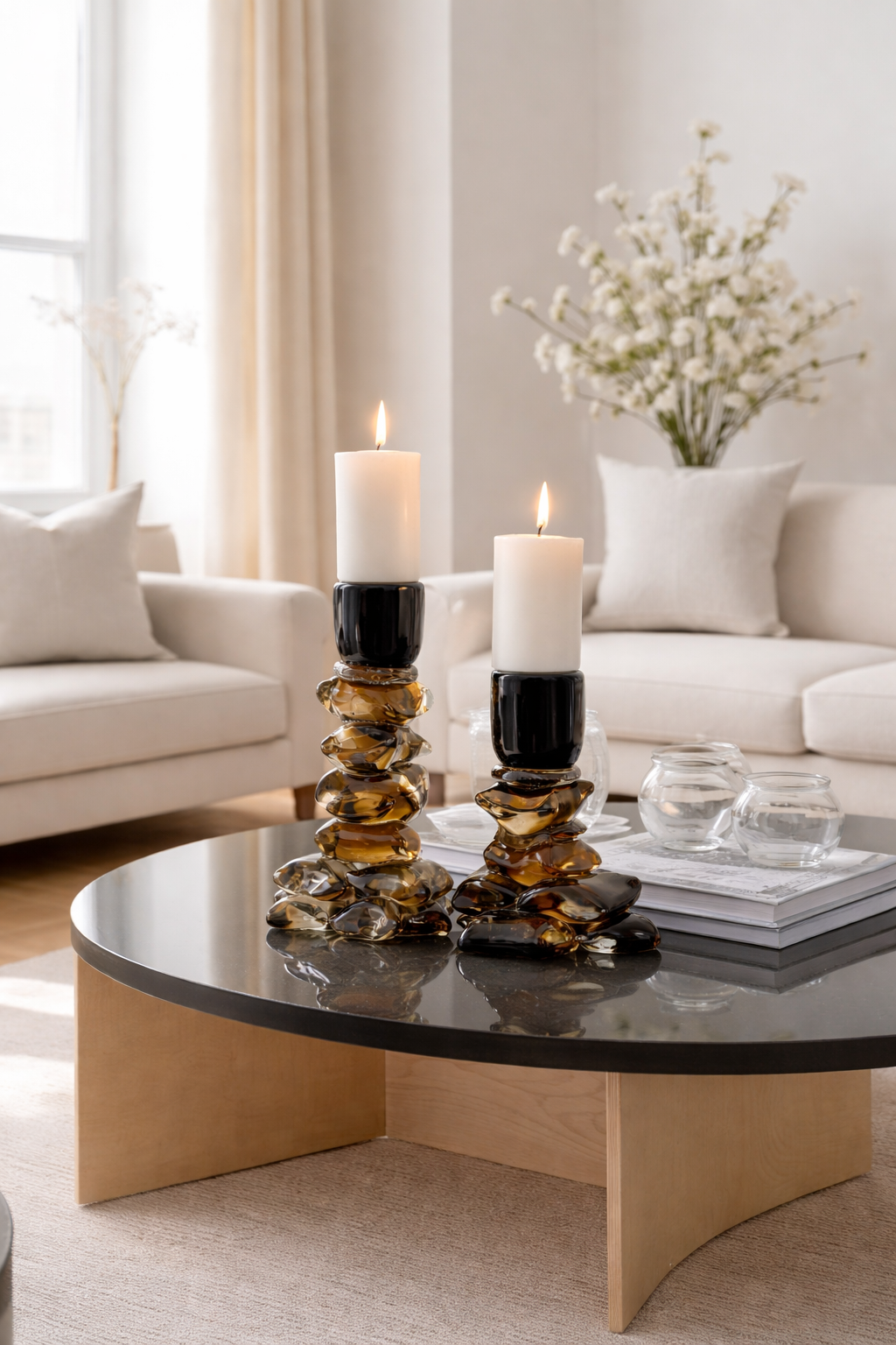 Decorative candle holders on a coffee table in a living room setting