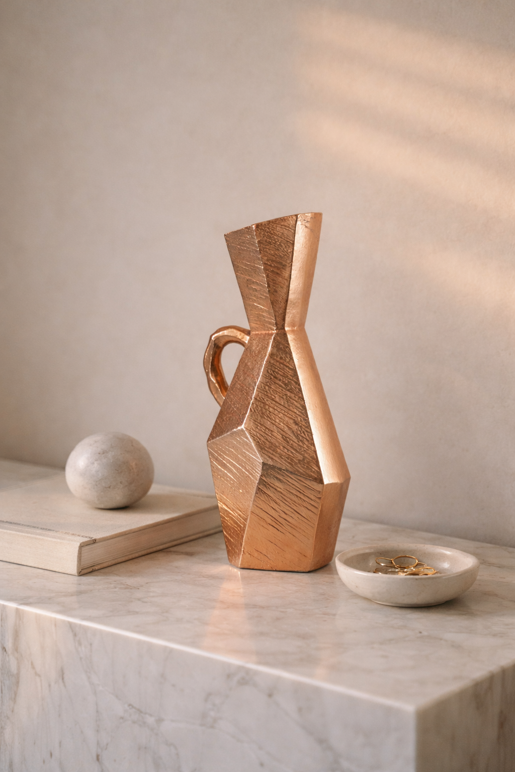 Geometric wooden vase on a marble surface with a neutral background