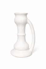 White ceramic pitcher on a white background