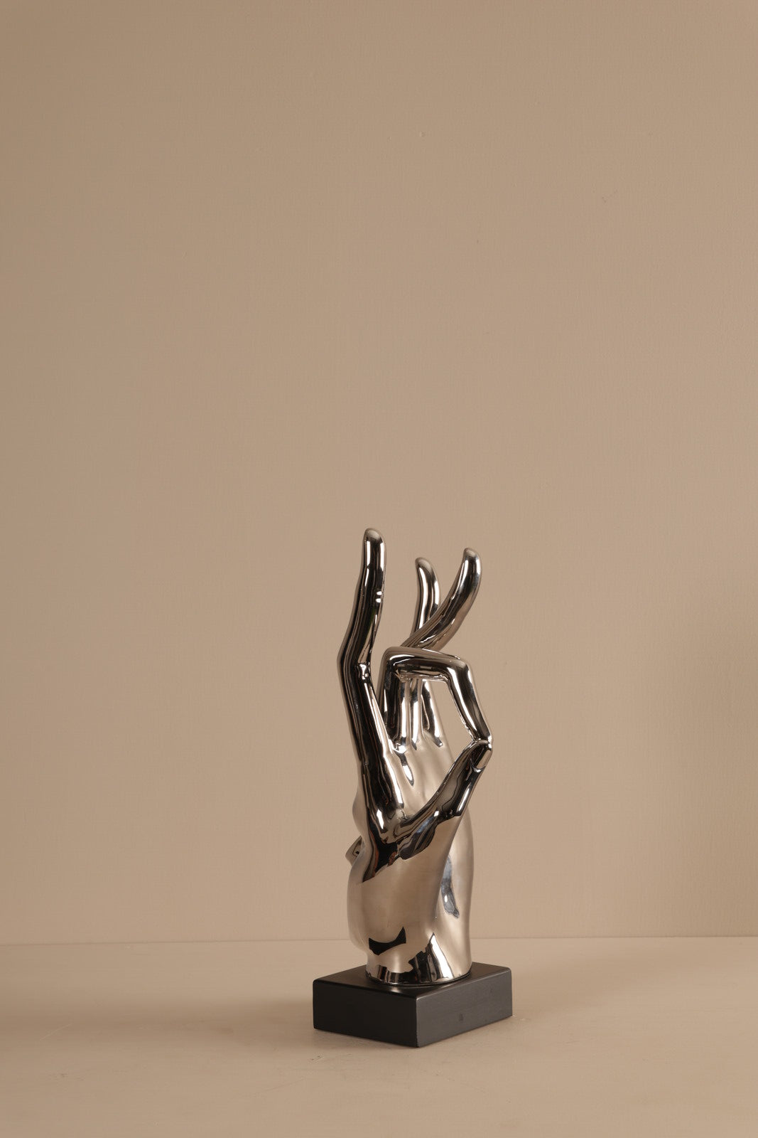 Palm Man Silver Sculpture