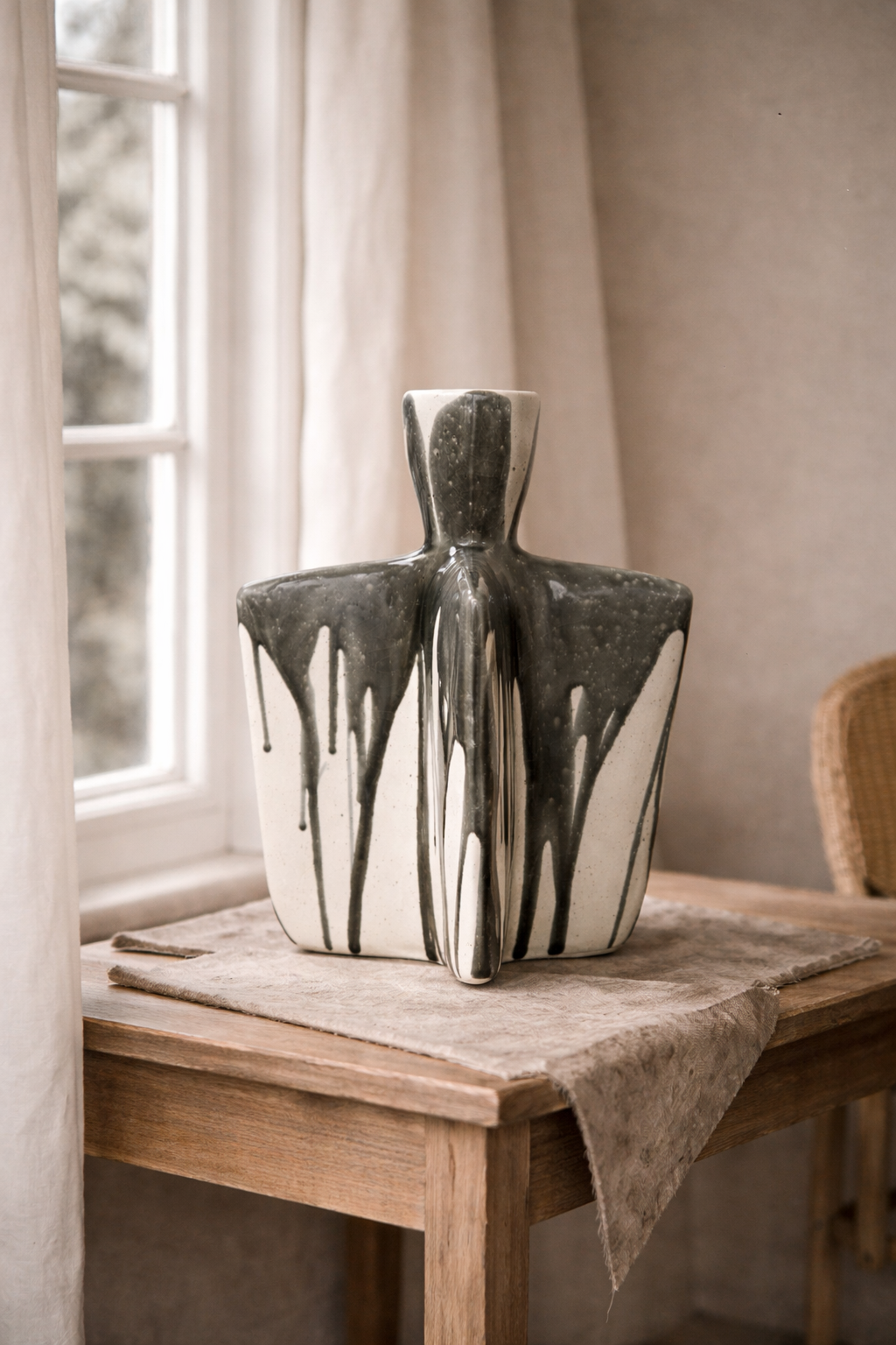 Decorative vase on a wooden table with a neutral background