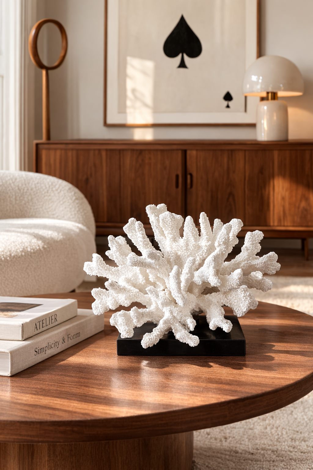 White coral sculpture on a wooden table with a modern interior background